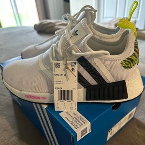 New in box. Never been worn. Women’s Adidas NMD R1 Size 6.5 $118